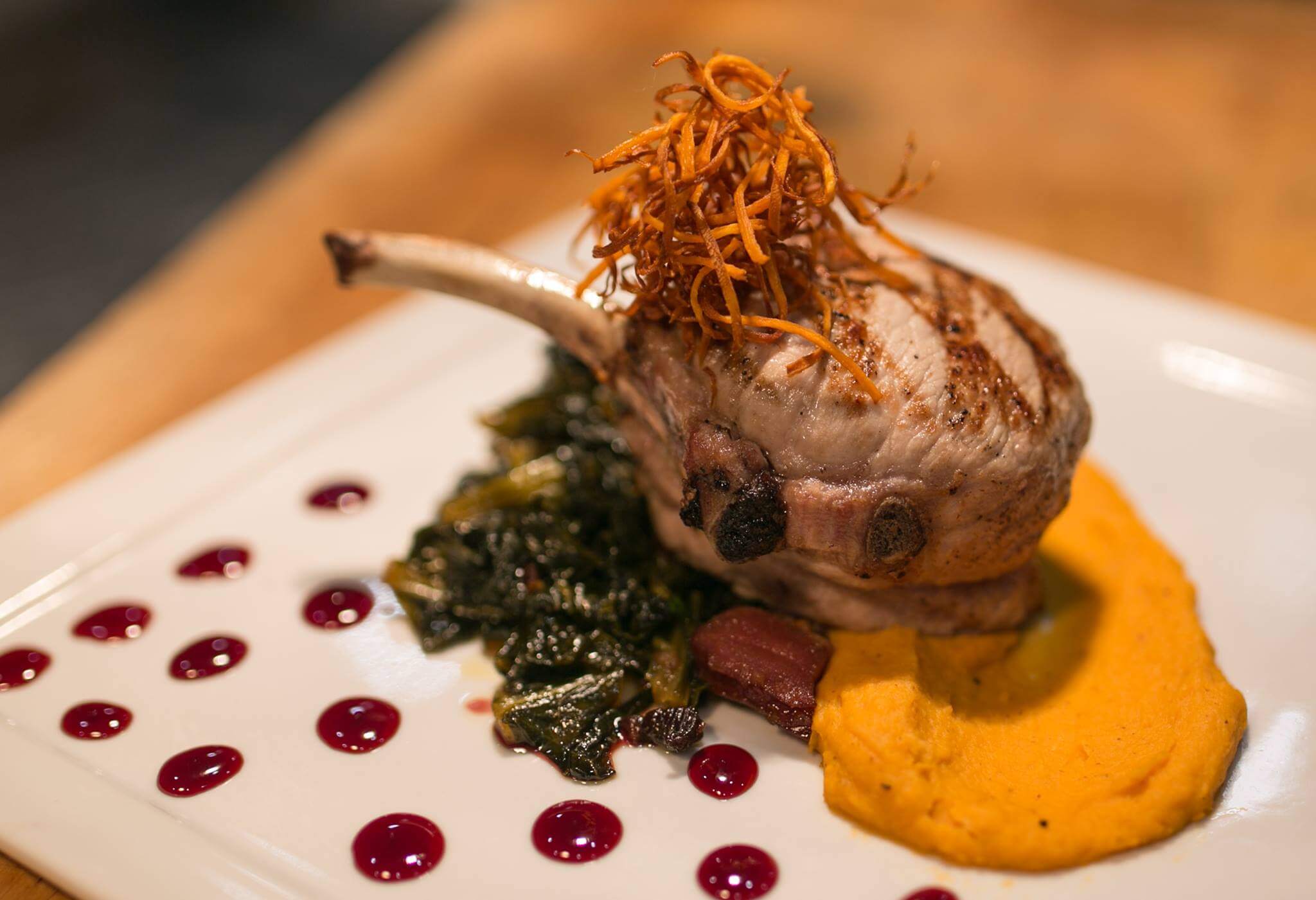 Fine dining dish prepared by Chef Paul Syms with elegant presentation and premium ingredients